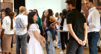 Psychology students stood in a hall