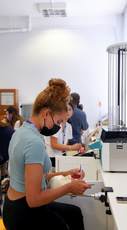 Dental student working on a phantom head