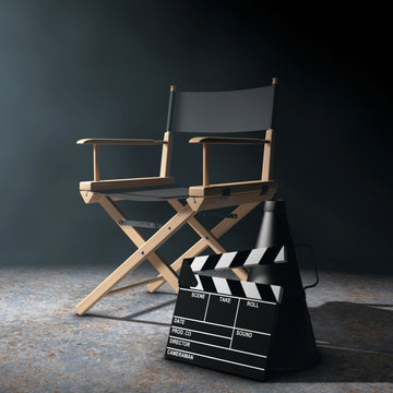 a film directors chair and clapperboard